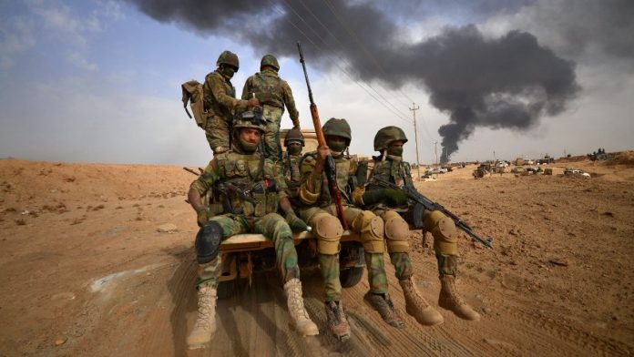 Shi'ite Popular Mobilization Forces (PMF) advance towards the city of Al-Qaim